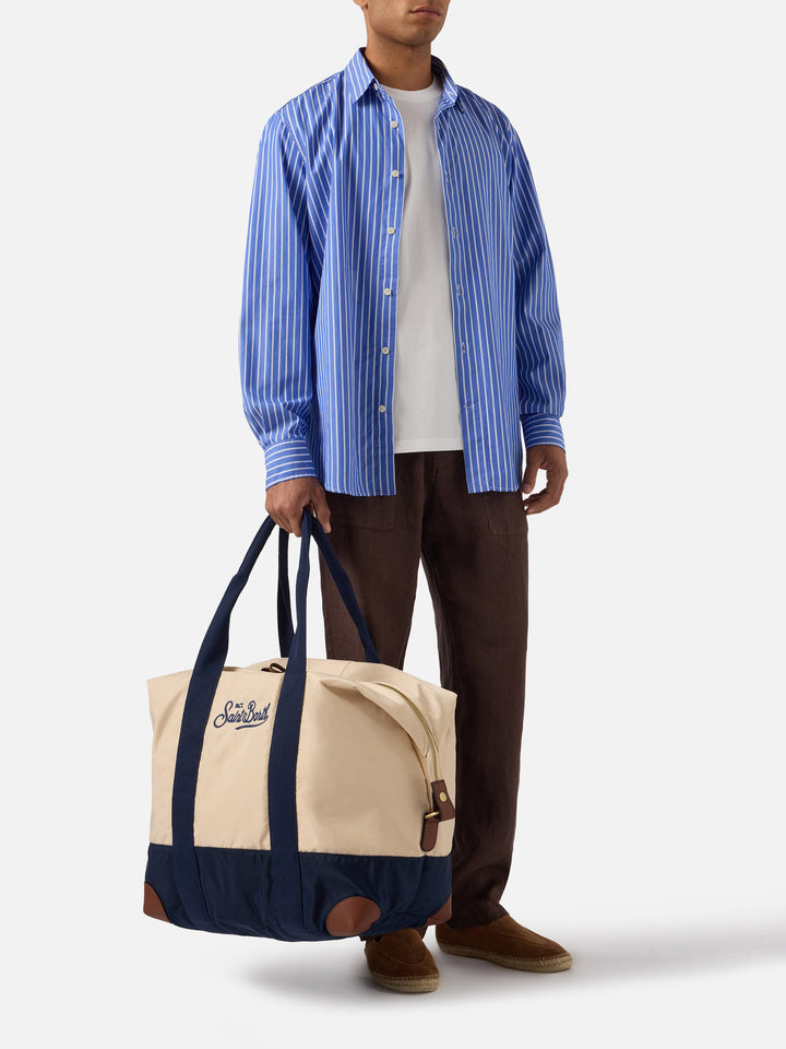 Borsone Travel Bag in nylon panna e blu con logo ricamato