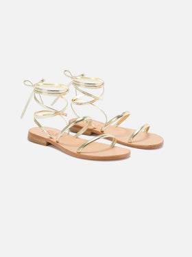 Essentials real laminated leather flip flops in gold