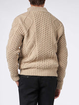 Man beige padded jacket with knitted braided sleeves