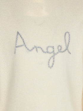 Girl white sweater angel wings embroidery