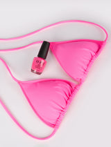 Woman fluo pink triangle bikini