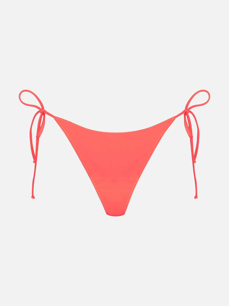 Woman fluo red swim briefs with side laces