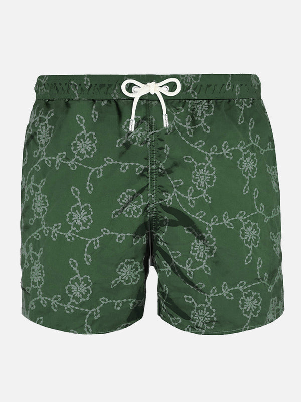 Green embroidered swim shorts