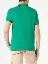 Green piquet polo with St. Barth logo