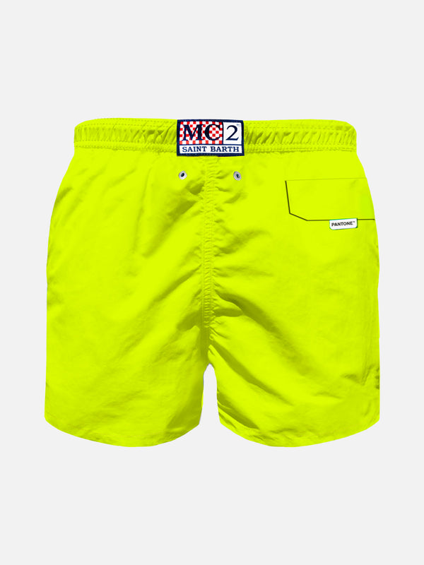 Boy fluo yellow swim shorts | PANTONE™ SPECIAL EDITION