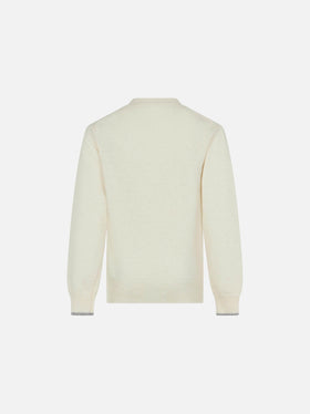 Girl crewneck sweater with All I need is snow lettering