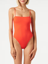 Woman orange one piece swimsuit