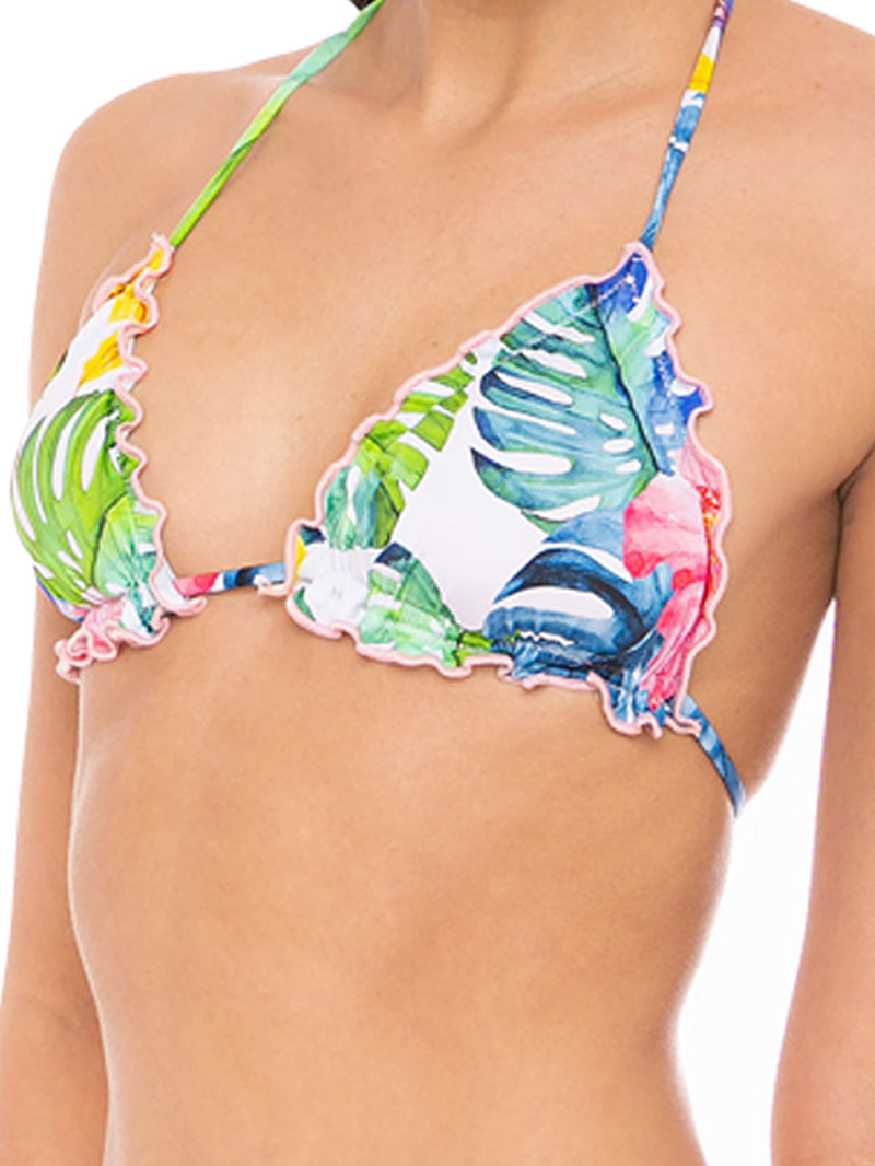 Woman triangle top swimsuit with tropical print