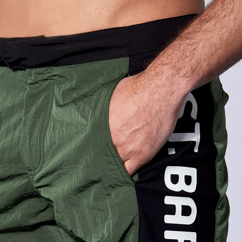 Military green swim shorts with contrast lateral band