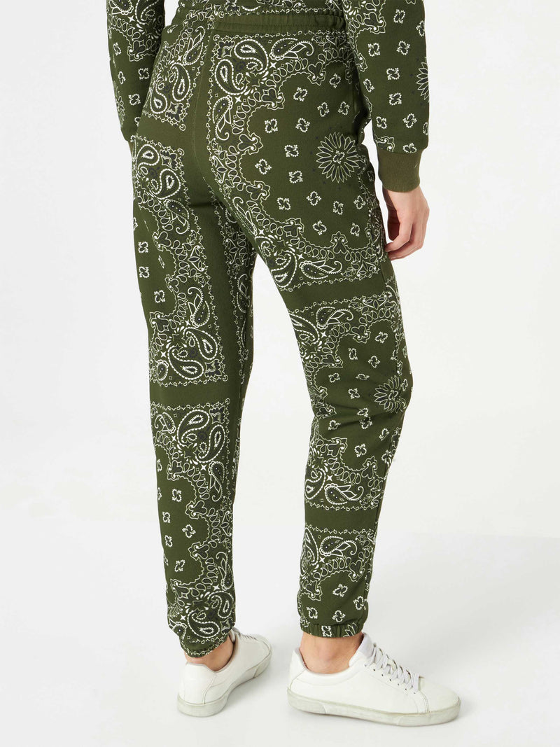 Woman fleece pants with green bandanna print