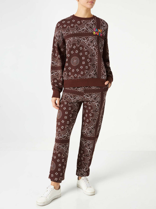 Woman fleece pants with brown bandanna print