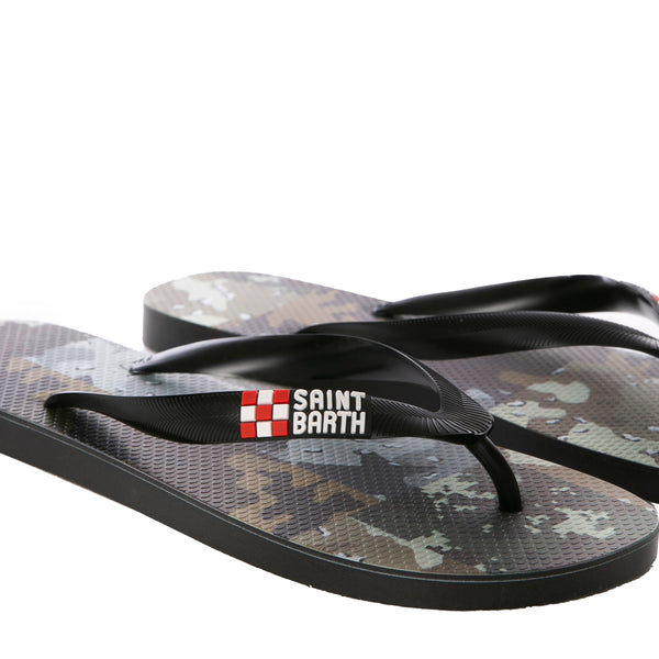 Man flip flops with camouflage patch