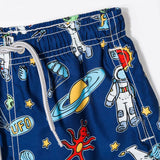 Boy swim shorts with astronaut print