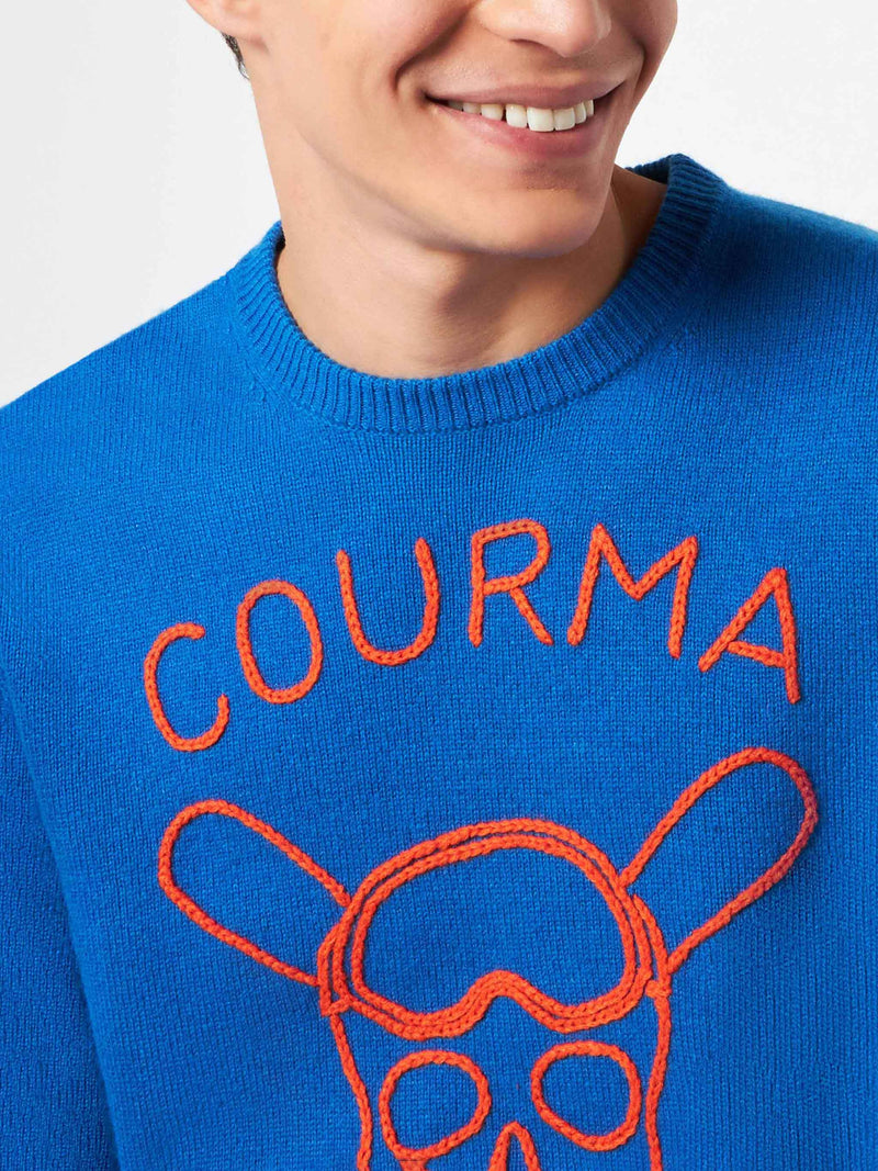 Man blue sweater with Courma Pirates embroidery