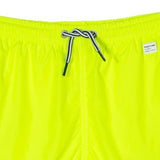 Jungen-Badeshorts aus hellem, fluogelbem Stoff | Pantone® Sonderausgabe